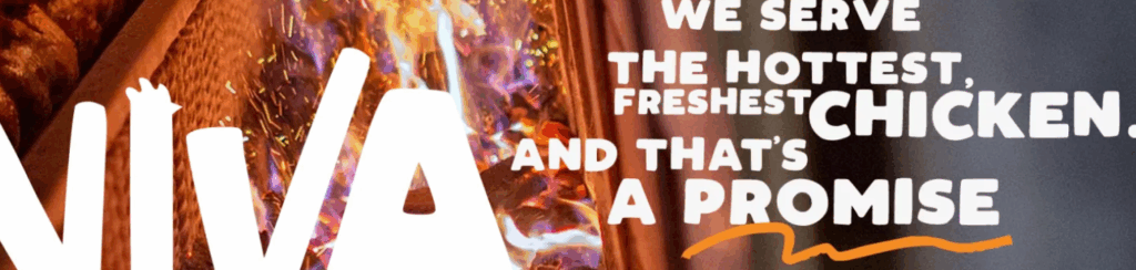 A sign reads, "We serve the hottest, freshest chicken. And that's a promise," with a fiery background and bold, white lettering.